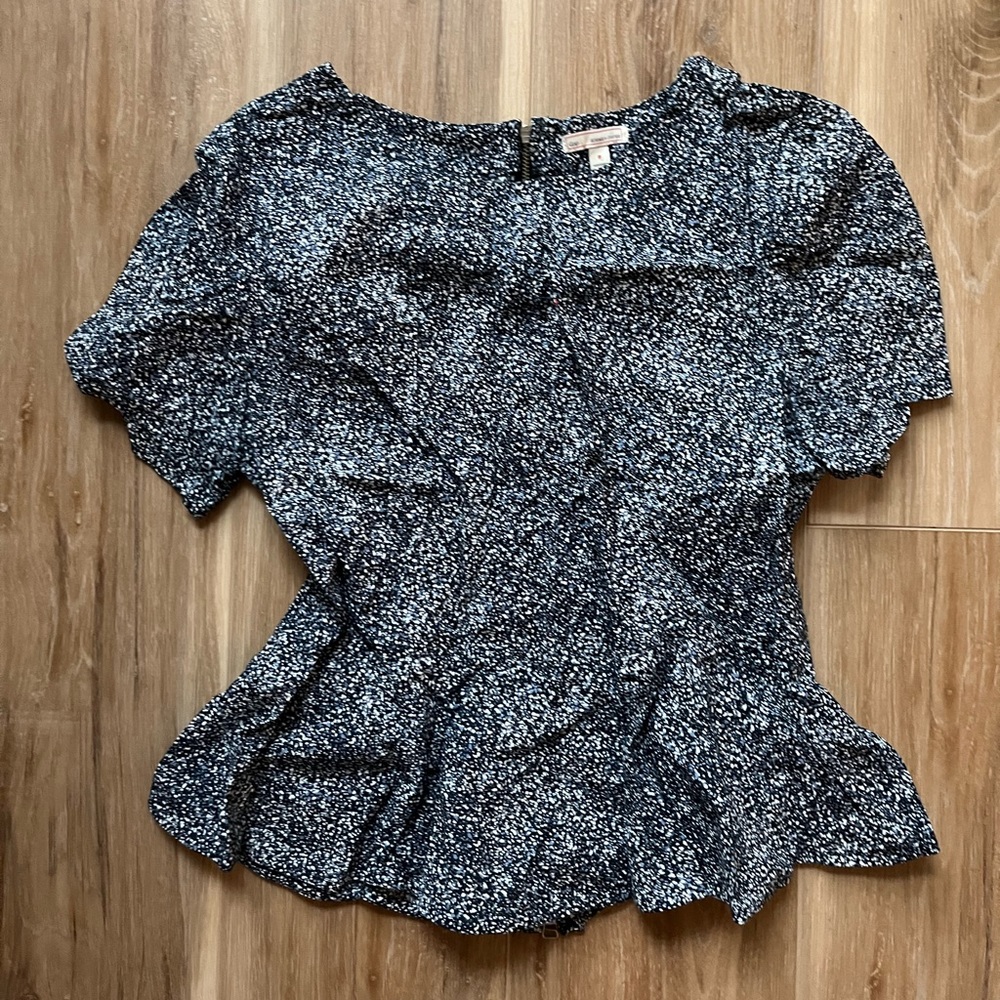 Navy and white adorable peplum blouse. Flattering fit. Size 8.